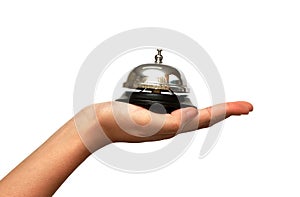 Woman hand giveing a hotel service bell