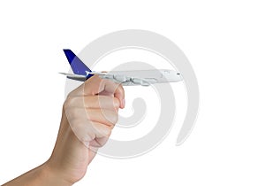 Woman hand holding airplane model- transport industry concepts-