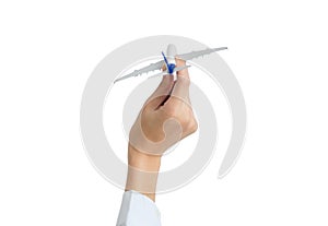 Woman hand holding airplane model- transport industry concepts-