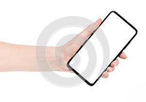 Woman hand holding the black new smartphone with blank screen isolated white background. hands using phone clipping path