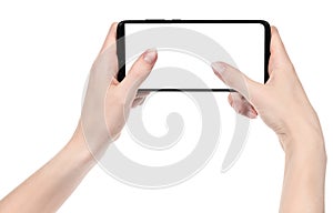 Woman hand holding the black new smartphone with blank screen isolated white background. hands using phone clipping path