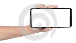 Woman hand holding the black new smartphone with blank screen isolated white background. hands using phone clipping path