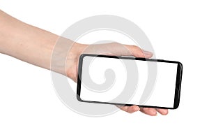 Woman hand holding the black new smartphone with blank screen isolated white background. hands using phone clipping path