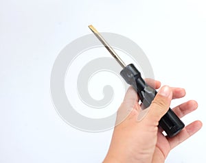 Woman hand holding black screwdriver isolate on a white background.Mechanic tools concept