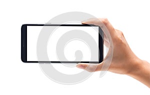 Woman hand holding the black smartphone with blank screen isolated on white background with clipping path.