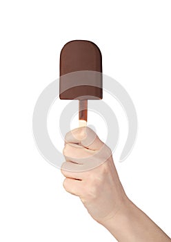 Woman hand holding chocolate popsicle isolated