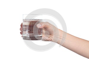 Woman hand holding a glass with water