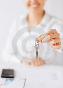 Woman hand holding house keys