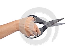 Woman hand holding a kitchen scissors