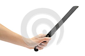 Woman hand holding knife for bread.