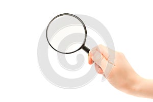 Woman hand holding magnifying glass isolated