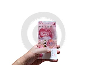 Woman hand holding one hundred Chinese yuan money stacking isolated on white background.