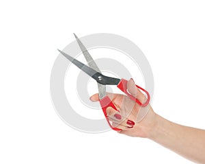 Woman hand holding red scissors