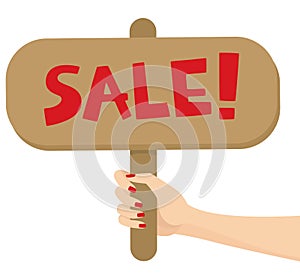 Woman hand holding a sale sign post