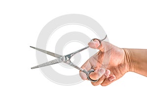 Woman hand holding scissors isolated on white background