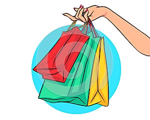 Woman hand holding shopping bags Shopping concept