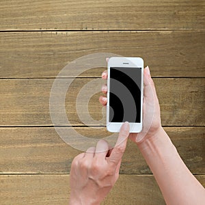 Woman hand holding and using mobile,cell phone