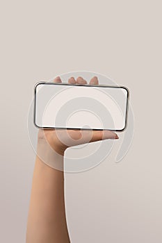 Woman hand holding white smart phone with blank space of screen display, smart phone and mockup concept, Isolated on white