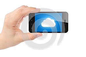 Woman hand holds smart phone with cloud computing concept