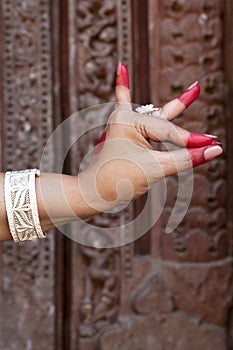 Woman hand mudra Kaakamukha elephant-apple.A type of gesture made with a single hand of indian classic dance odissi