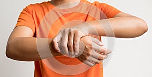 Woman hand with numbness and pain in the wrist has pain and tingling in the nerve endings. which is a side effect of Guillain-
