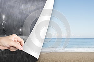 Woman hand open calm beach page replace stormy ocean photo