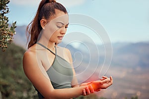 Woman hand pain, exercise injury and wrist accident outdoor from training, fitness and hiking in glowing red. Health