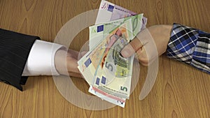 Woman hand pay dirty illegal euro cash banknote for man. 4K