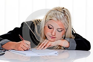 Woman with hand and pen writes photo