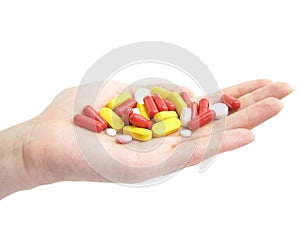 Woman hand with pills. Medical topics