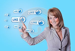 Woman hand pressing Social Network icon