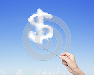 Woman hand pulling rope connected with dollar sign clouds