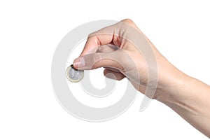 Woman hand putting an euro coin