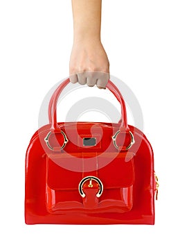 Woman hand with red bag