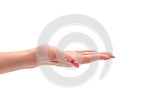 Woman hand with red nails holding something
