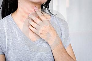 Woman hand scratching on her neck, itchy skin