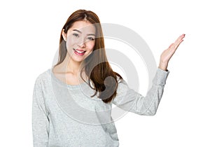 Woman with hand show with something