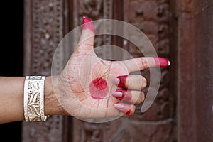 Woman hand showing Tamrachuda hasta hand gesture, also called mudra meaning `rooster` of indian classic dance odissi. Also use