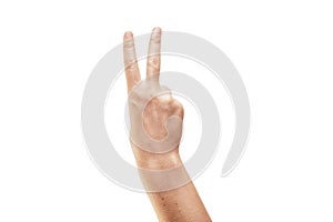 A woman Hand showing victory sign on white background