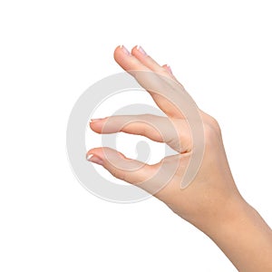 Woman hand shows pinch to zoom