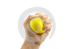 Woman hand squeezing a stress ball on white background