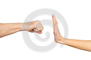 Woman hand stoping a man fist on a white background