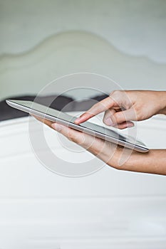 Woman hand on tablet pc, access for knowledge