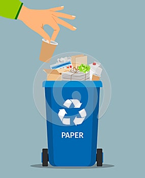 Woman hand throws garbage