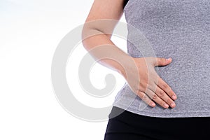 Woman hand touching stomach, waist, or liver position isolated white background. Health care and medical concept