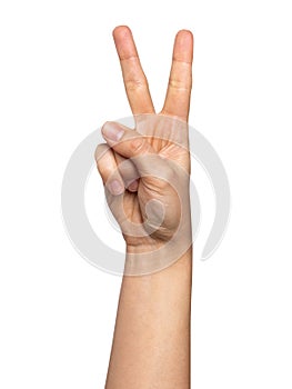 Woman hand with two fingers concept of victory isolated on white background