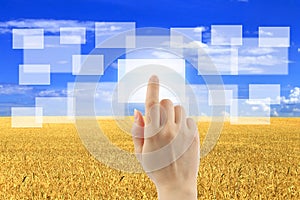 Woman hand uses touch screen interface