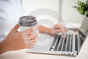 Woman hand using keyboard computer