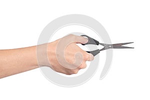 Woman hand using a scissors