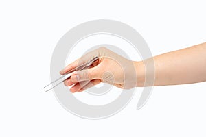 woman hand using a small tweezers